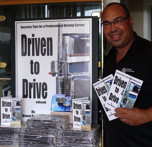Bruce with his book Driven to Drive